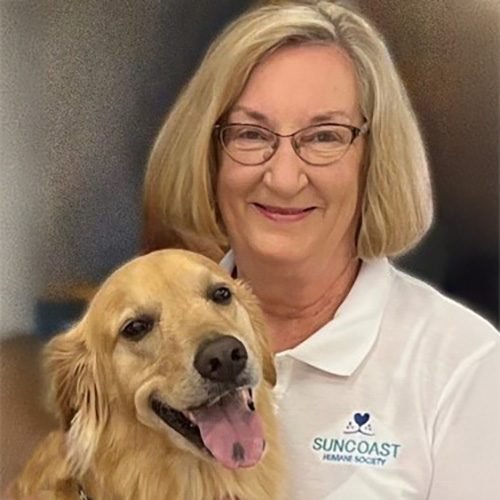 Claire Berten with a Golden Retriever